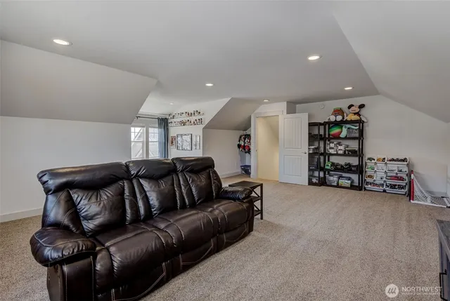 a living room with furniture and a couch