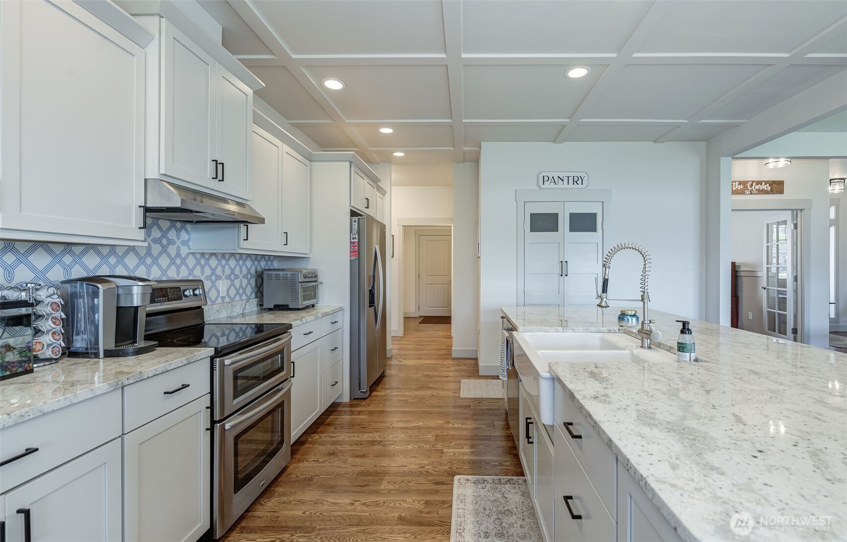 826 Autumn Crest Drive Wenatchee, WA 98801 - Photo 7 of 38 a large kitchen with stainless steel appliances granite countertop a sink stove and refrigerator