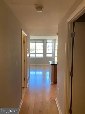 a kitchen with a sink and a window