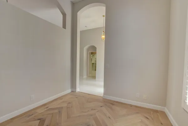 a view of a hallway with closet