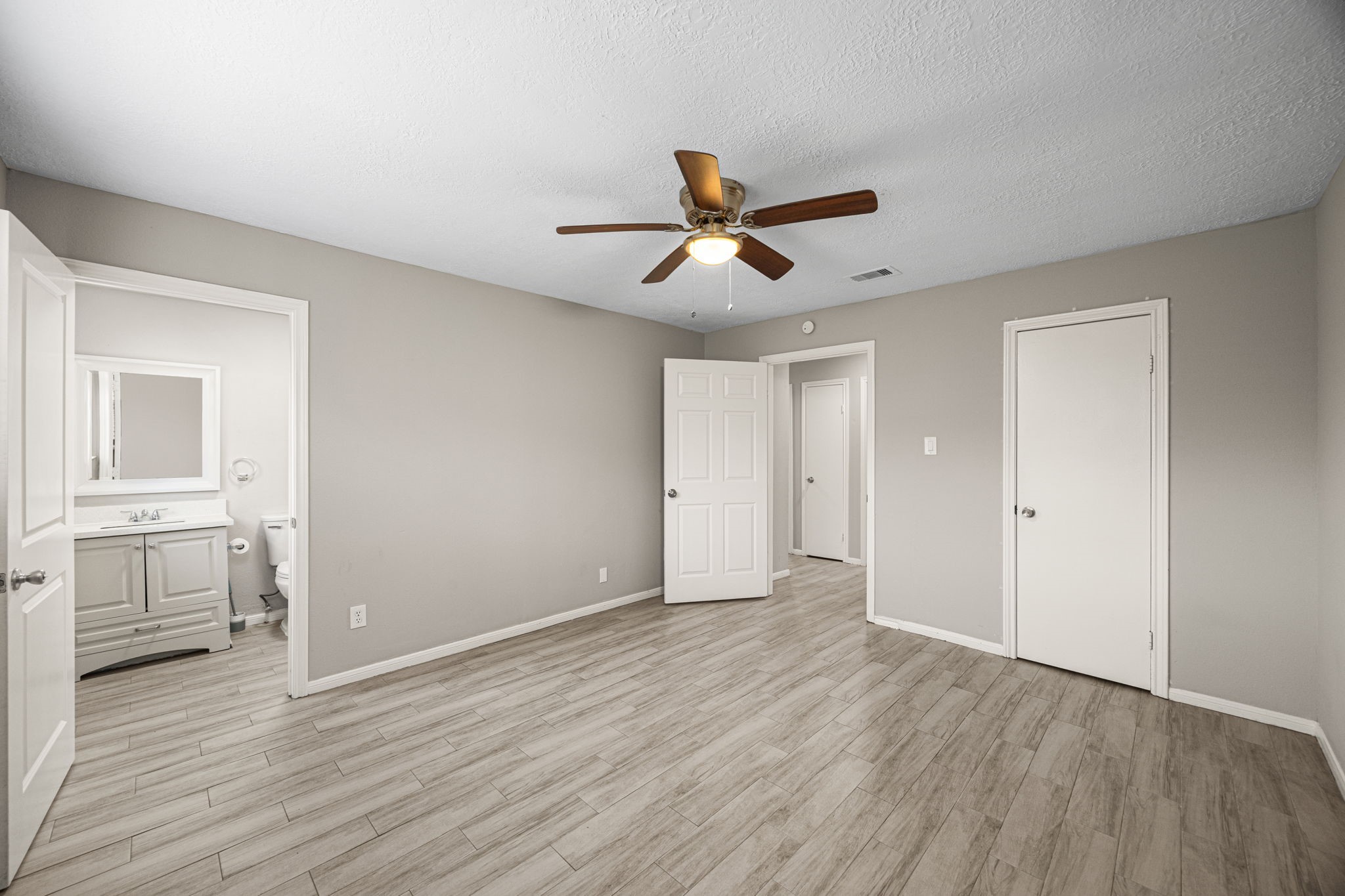 2302 Marble Falls Drive Spring, TX 77373 - Photo 12 of 24 a view of an empty room and window with wooden floor
