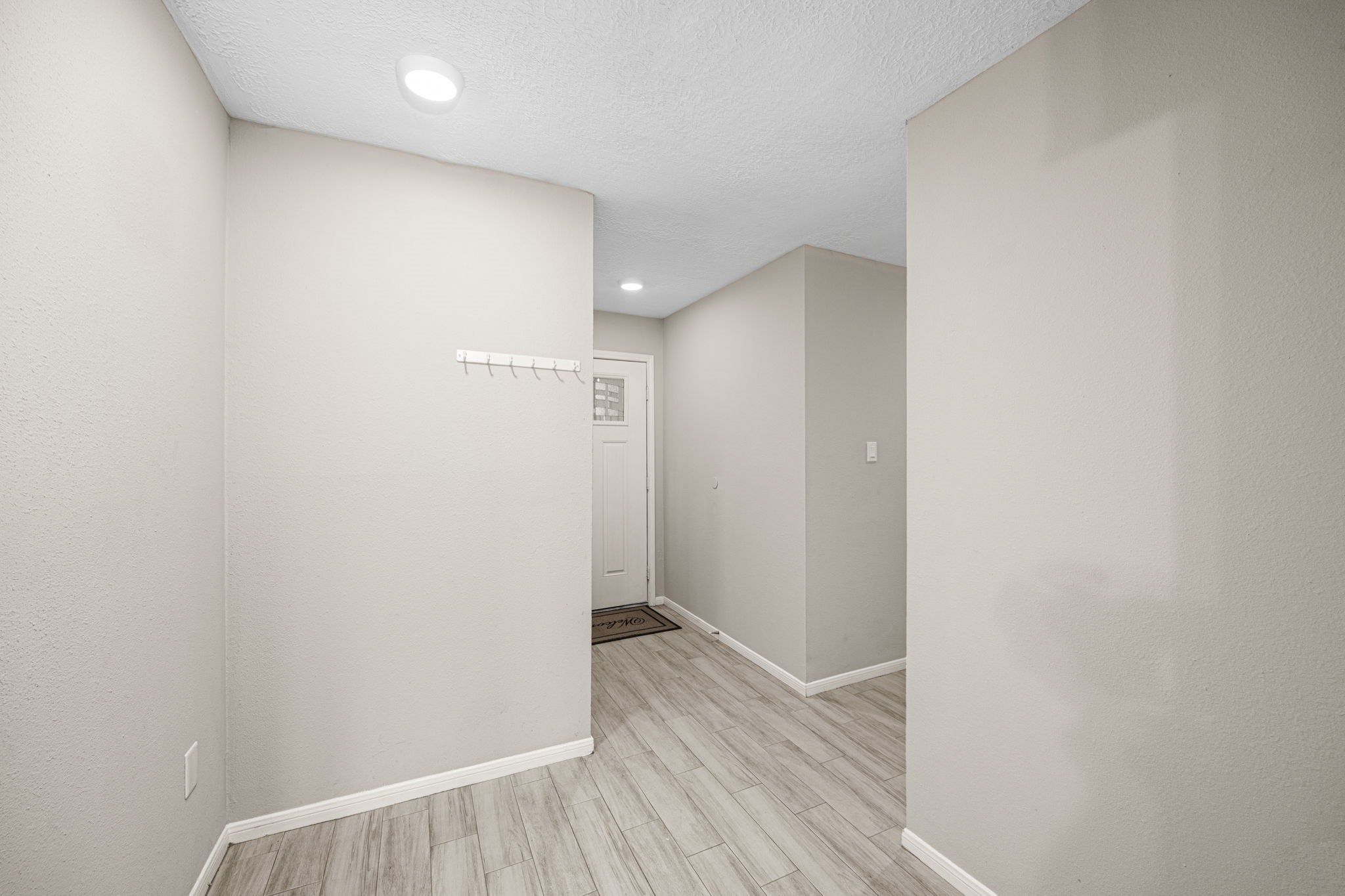 2302 Marble Falls Drive Spring, TX 77373 - Photo 14 of 24 a view of hallway with wooden floor