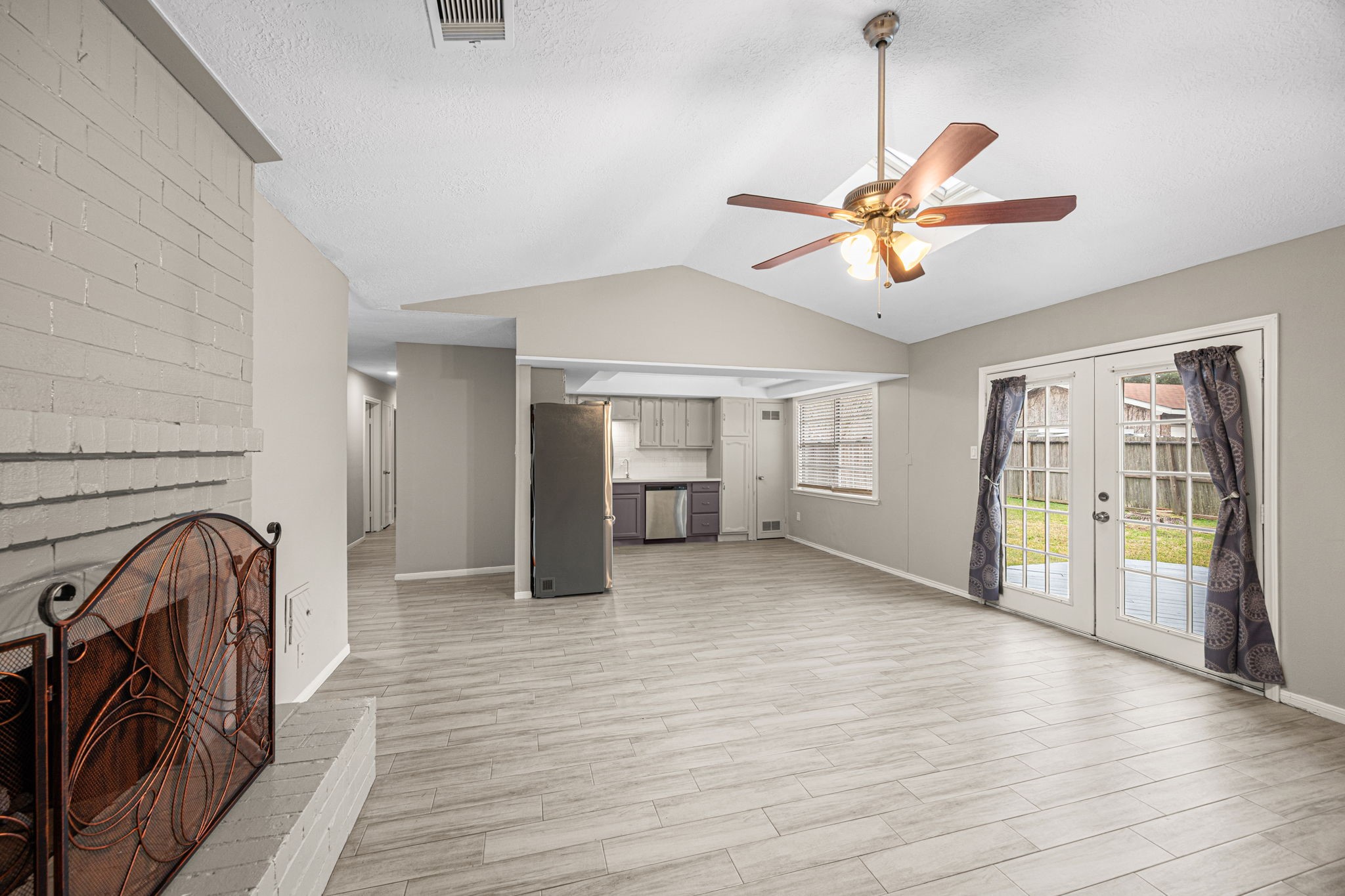 2302 Marble Falls Drive Spring, TX 77373 - Photo 16 of 24 a view of empty room with wooden floor and fan
