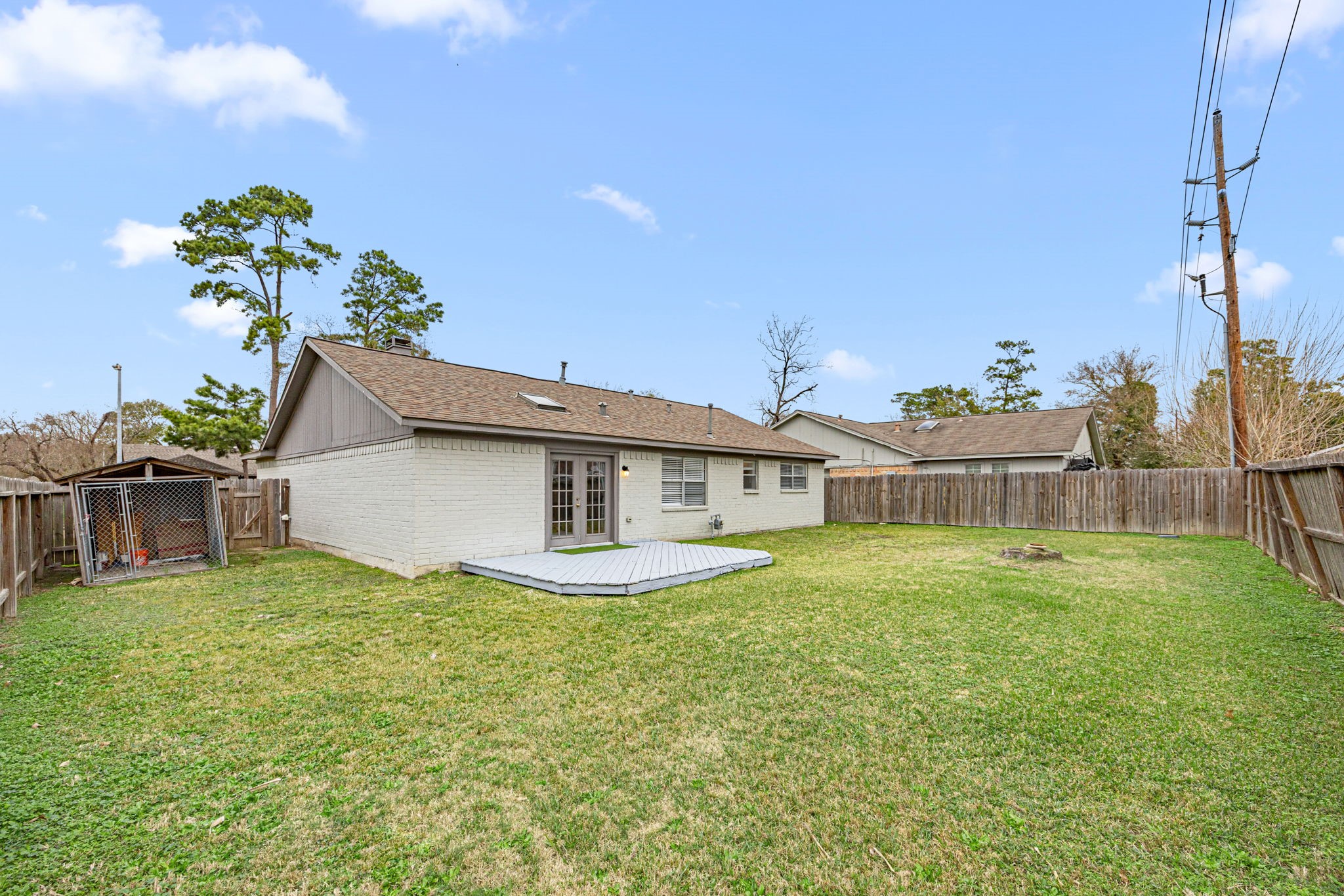 2302 Marble Falls Drive Spring, TX 77373 - Photo 21 of 24 a house view with a garden space
