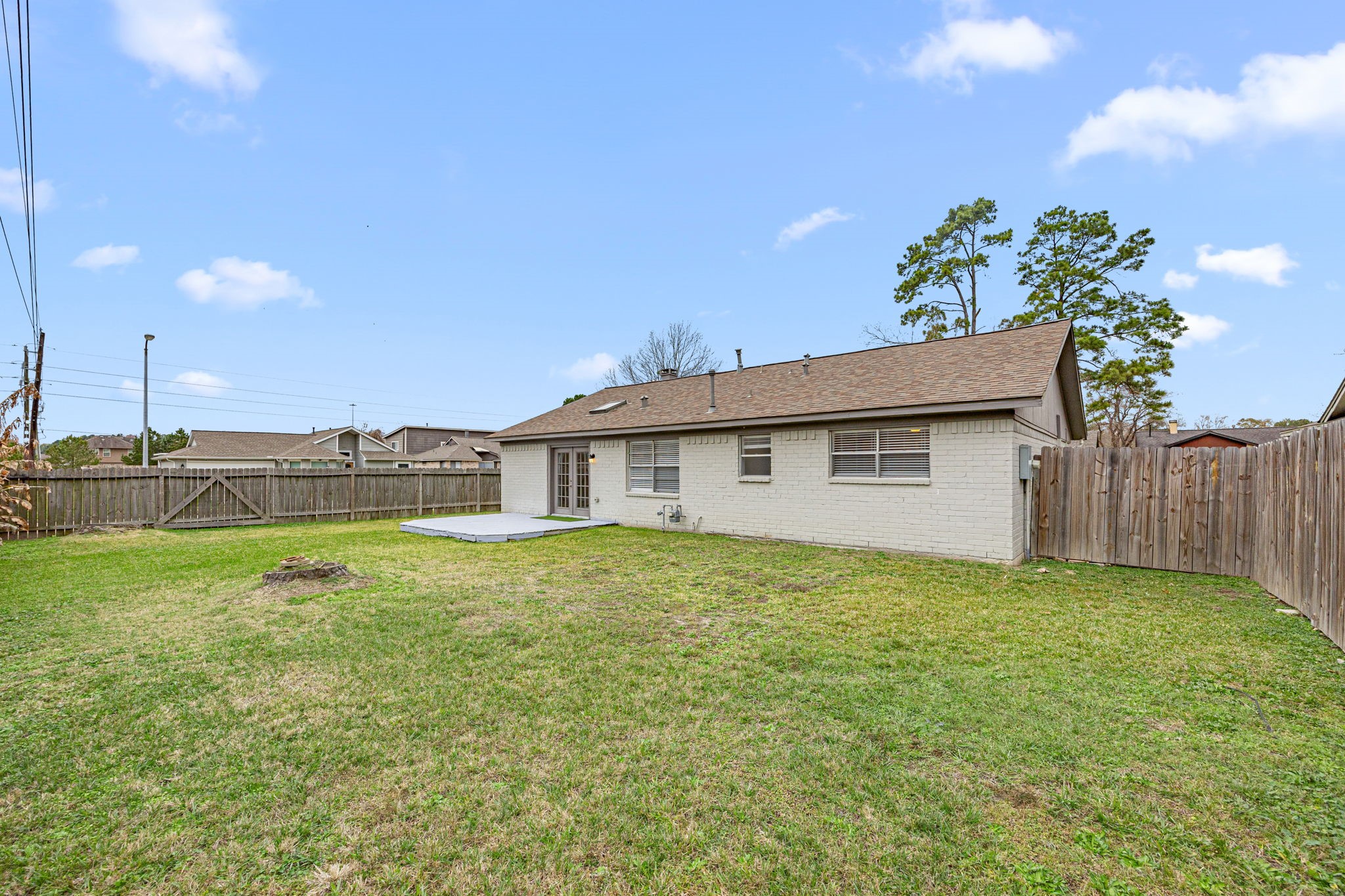 2302 Marble Falls Drive Spring, TX 77373 - Photo 22 of 24 a view of a house with a yard