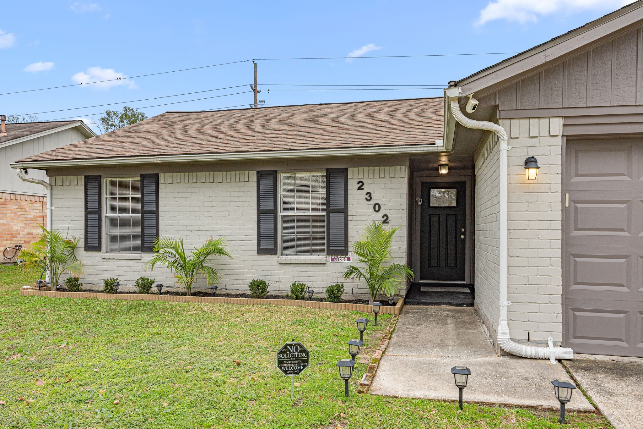 2302 Marble Falls Drive Spring, TX 77373 - Photo 3 of 24 a front view of a house with garden