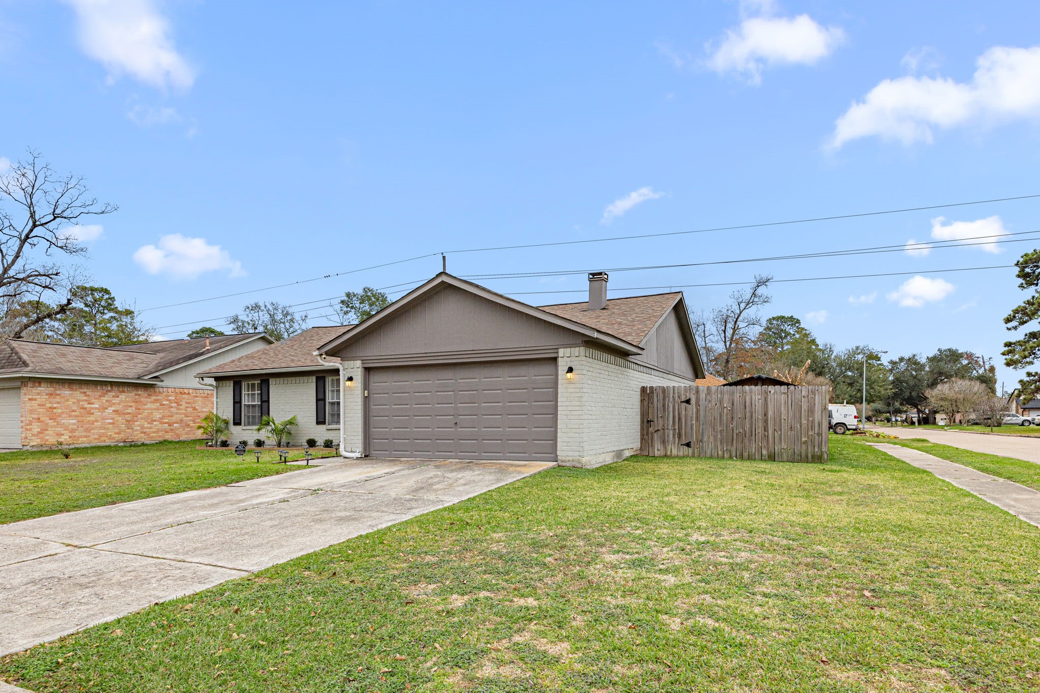 2302 Marble Falls Drive Spring, TX 77373 - Photo 5 of 24 a view of a house with a big yard plants and large trees