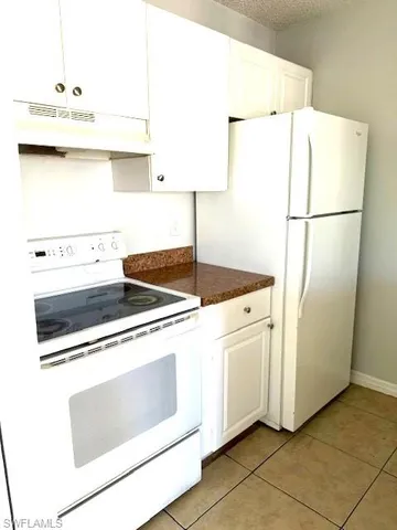 a bathroom with a mirror and a shower
