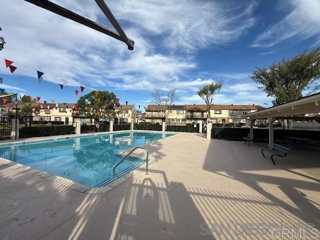 10385 Seth Way Santee, CA 92071 - Photo 27 of 33 a view of a swimming pool and a yard