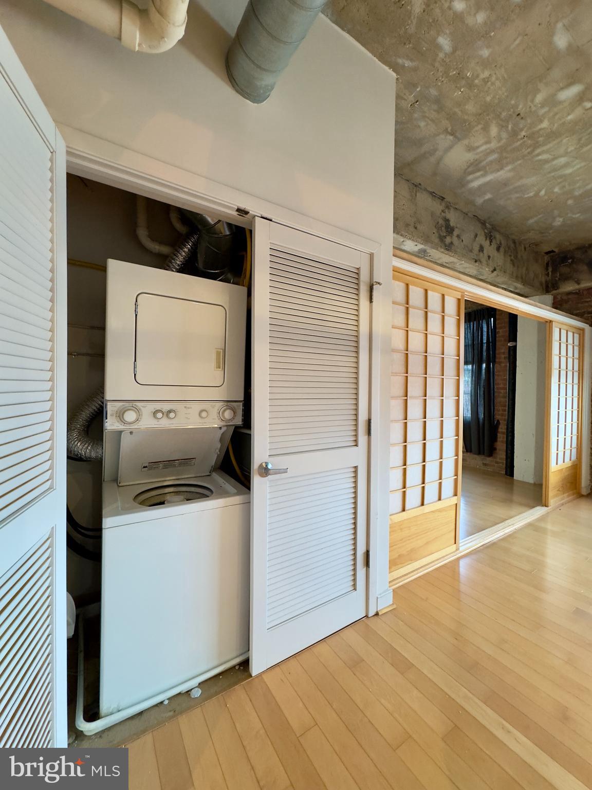 234 Holliday Street, Unit 403 Baltimore, MD 21202 - Photo 11 of 11 a kitchen with a refrigerator and microwave