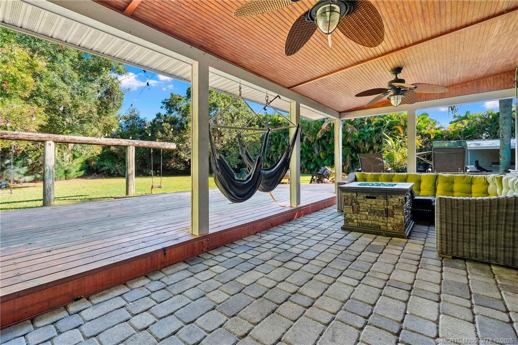 1699 Northwest Britt Road Stuart, FL 34994 - Photo 26 of 54 a outdoor view with a sitting space
