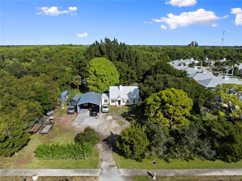 1699 Northwest Britt Road Stuart, FL 34994 - Photo 37 of 54 a view of a garden