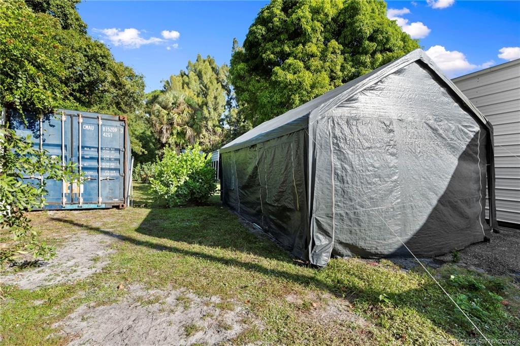 1699 Northwest Britt Road Stuart, FL 34994 - Photo 54 of 54 a view of backyard with tree