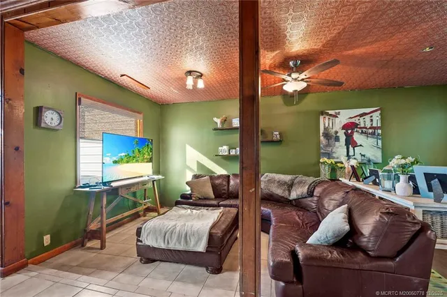 a workspace with furniture and window