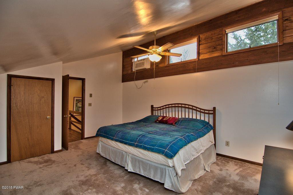 3042 Northgate Road Lake Ariel, PA 18436 - Photo 22 of 37 a bedroom with a bed and window