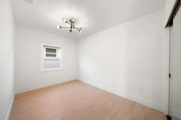 a room with furniture and a flat screen tv