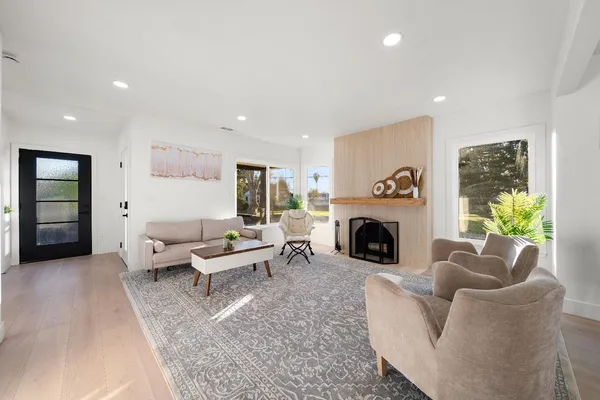 a kitchen with stainless steel appliances a refrigerator and a sink