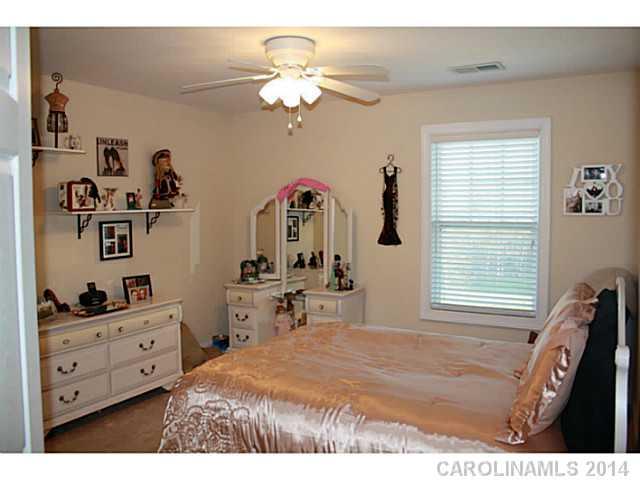 1032 Ridgehaven Road Waxhaw, NC 28173 - Photo 12 of 16 a view of a bedroom with window