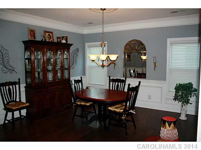 1032 Ridgehaven Road Waxhaw, NC 28173 - Photo 3 of 16 a view of a dining room with furniture and window