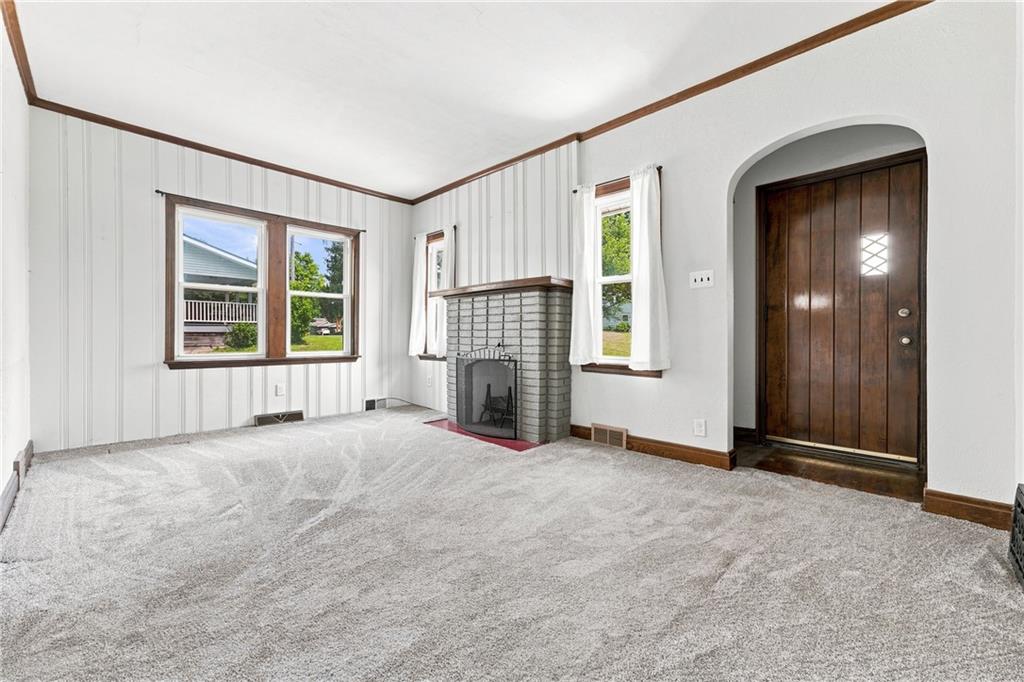 1901 Line Road New Castle, PA 16105 - Photo 9 of 30 an empty room with windows and fireplace