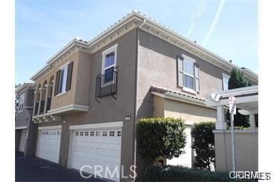 3320 Shadetree Way Camarillo, CA 93012 - Photo 2 of 19 a view of a building with a street