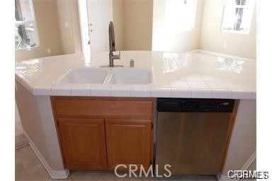 3320 Shadetree Way Camarillo, CA 93012 - Photo 5 of 19 a bathroom with a sink and a mirror