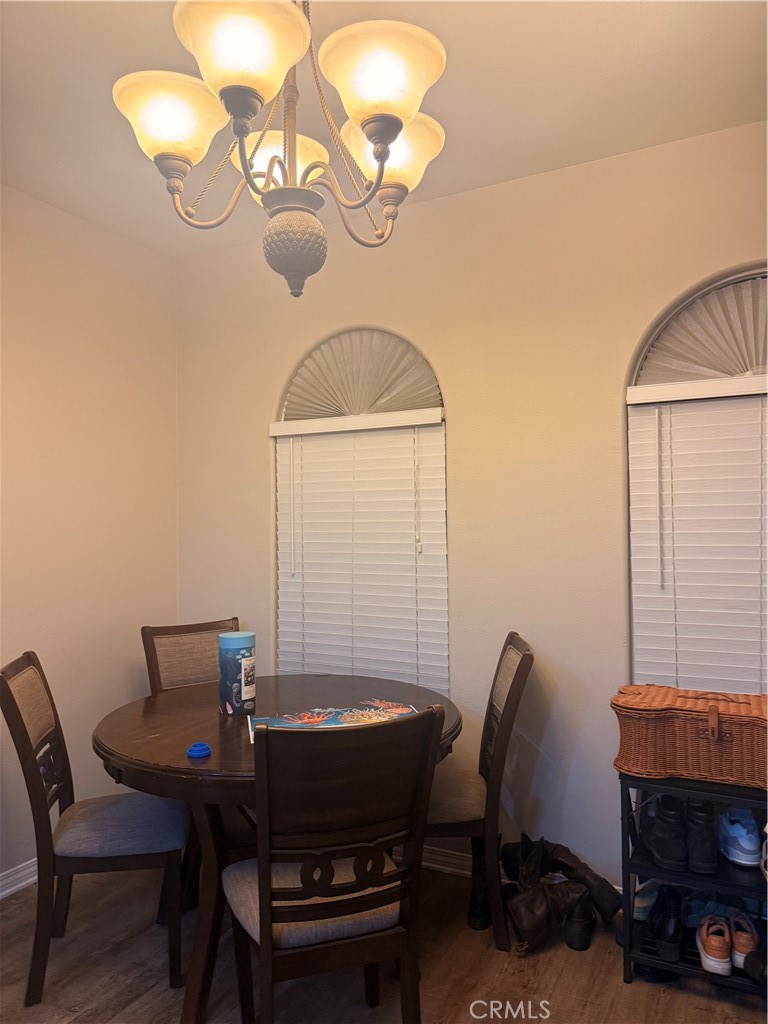 3320 Shadetree Way Camarillo, CA 93012 - Photo 6 of 19 a view of a dining room with furniture and wooden floor