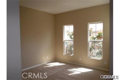 3320 Shadetree Way Camarillo, CA 93012 - Photo 9 of 19 a view of an empty room with a window