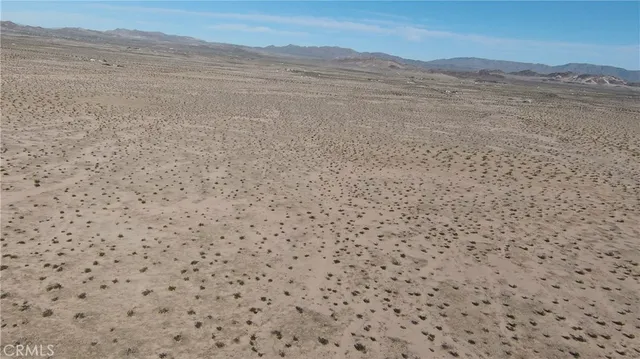 a view of ocean and a mountain