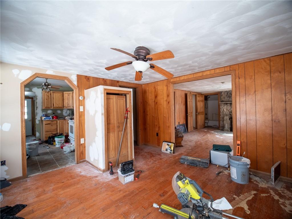 1276 Glades Pike Somerset, PA 15501 - Photo 22 of 32 a living room with patio furniture and a chandelier
