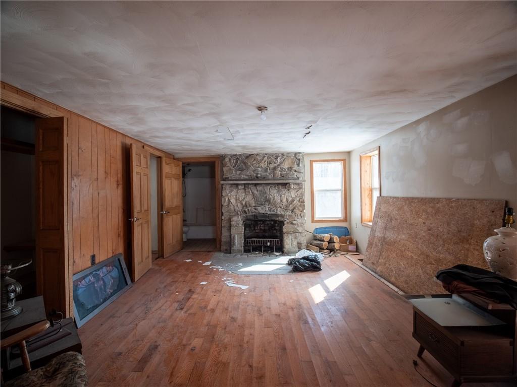 1276 Glades Pike Somerset, PA 15501 - Photo 25 of 32 a living room with furniture and a fireplace