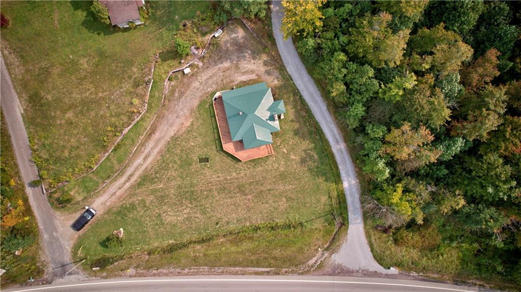 1276 Glades Pike Somerset, PA 15501 - Photo 3 of 32 front view of a house with a yard