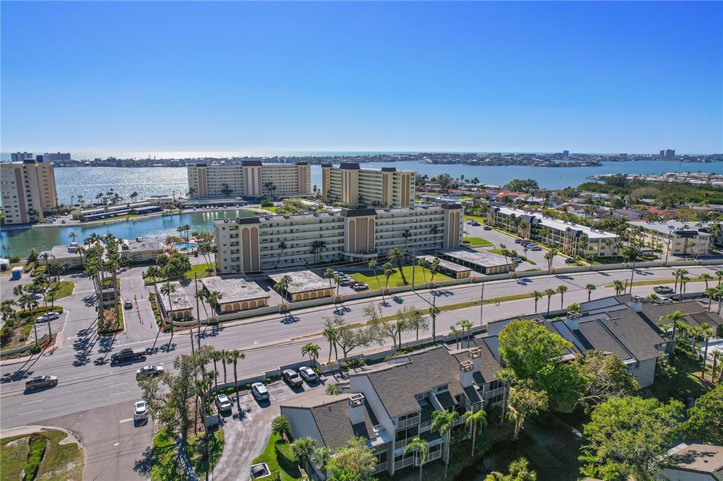 4650 Cove Circle, Unit 611 St. Petersburg, FL 33708 - Photo 21 of 25 an aerial view of a city with lots of residential buildings