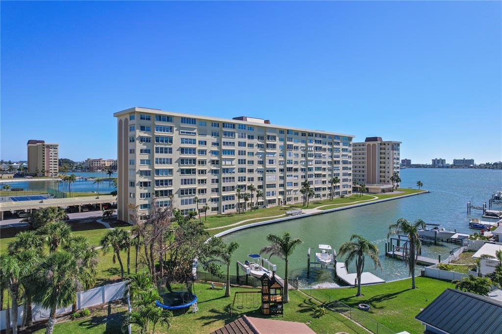 4650 Cove Circle, Unit 611 St. Petersburg, FL 33708 - Photo 25 of 25 a view of a city skyline with a lake view