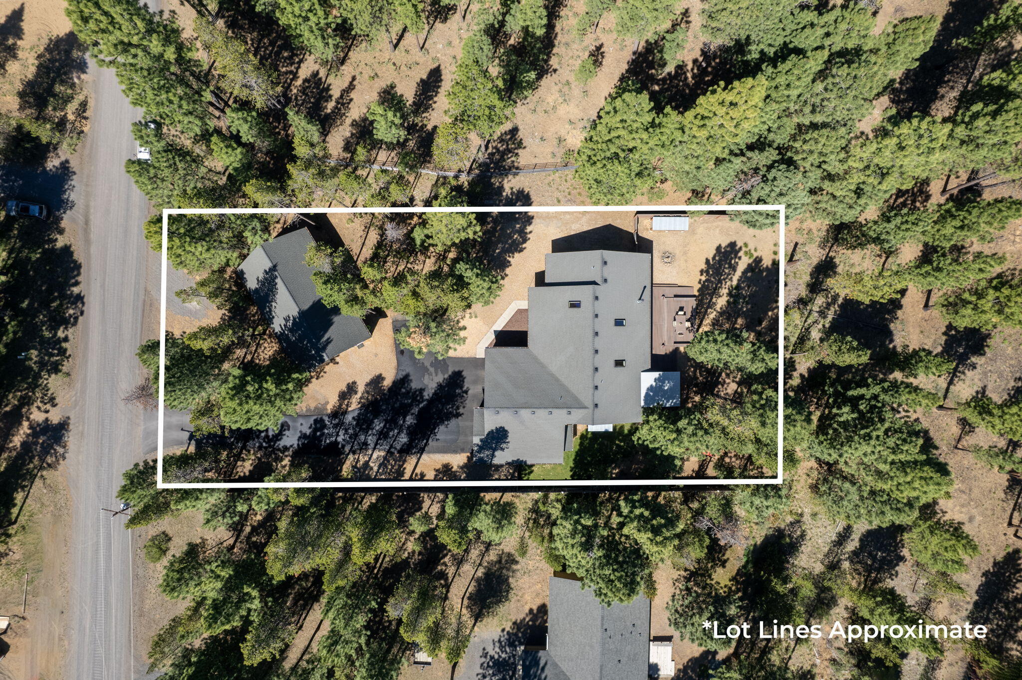 16938 Quartz Hill Road Bend, OR 97707 - Photo 3 of 52 an aerial view of a house with a yard and lake view