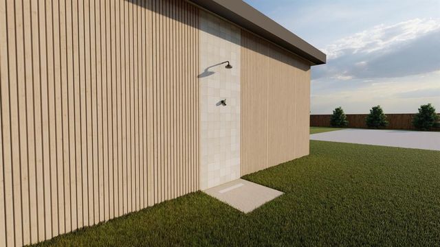 a view of a patio with couches table and chairs with garden view