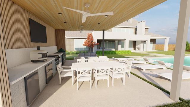 a view of a patio with chairs next to a yard