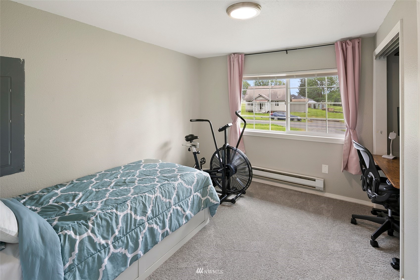 14416 Connelly Road Snohomish, WA 98296 - Photo 12 of 24 a bedroom with a bed and a window