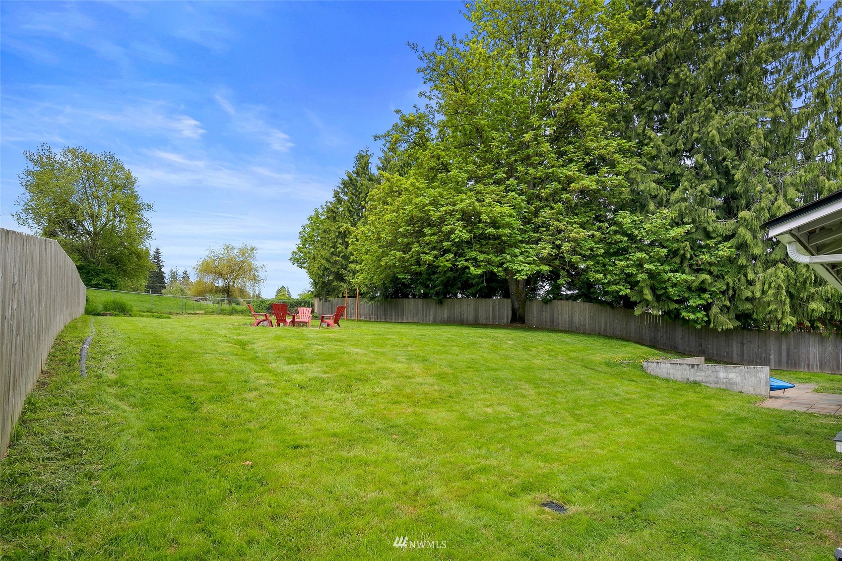 14416 Connelly Road Snohomish, WA 98296 - Photo 18 of 24 a view of a field of grass and trees