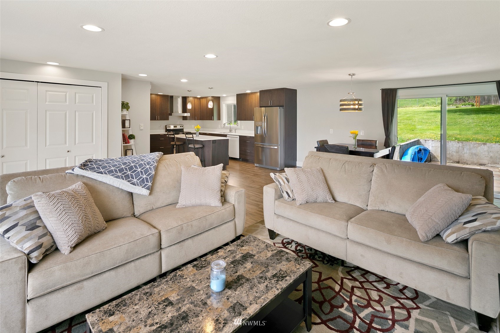 14416 Connelly Road Snohomish, WA 98296 - Photo 7 of 24 a living room with furniture and a large window