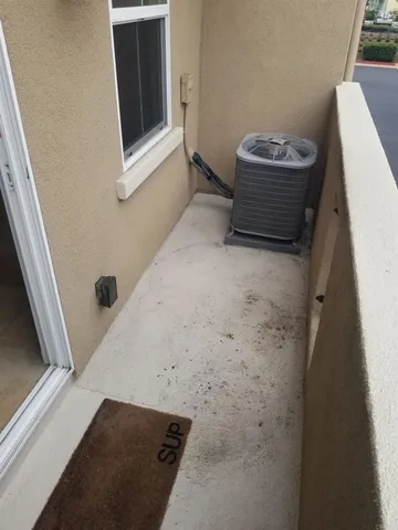 a view of a swimming pool with a patio and a garden