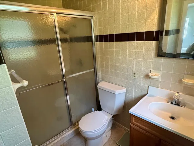 a bathroom with a sink and toilet
