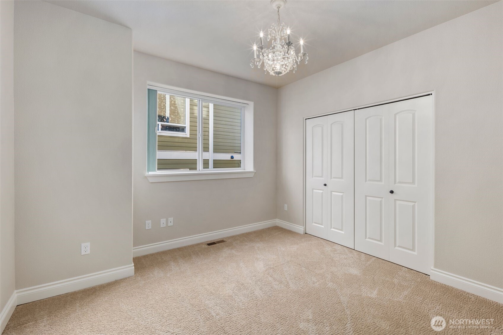 3224 Overlook Loop Ilwaco, WA 98624 - Photo 29 of 38 a view of an empty room with a window