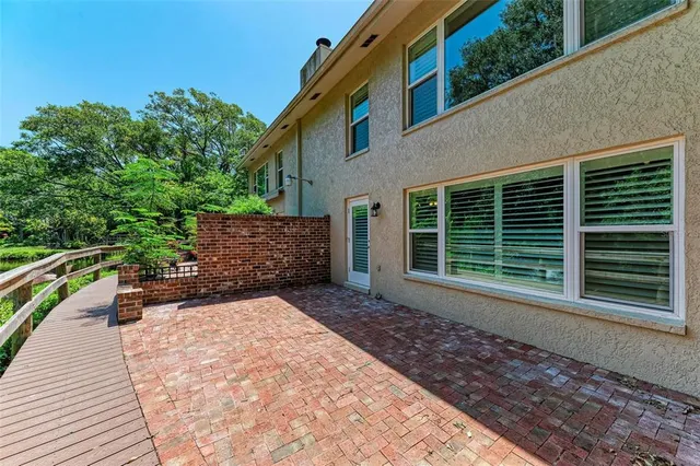 a view of backyard with green space