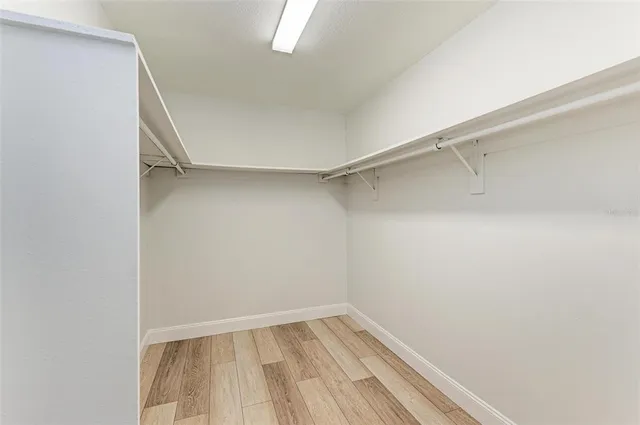 a view of an empty walk in closet