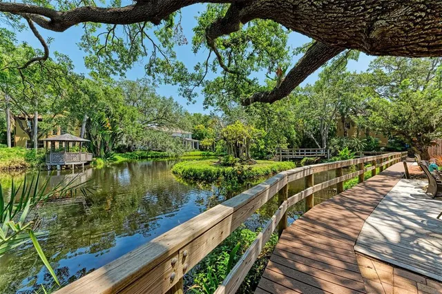 a view of balcony and yard