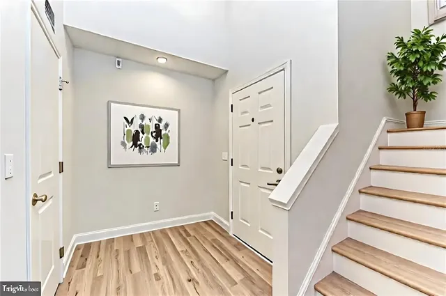 a view of a hallway with staircase