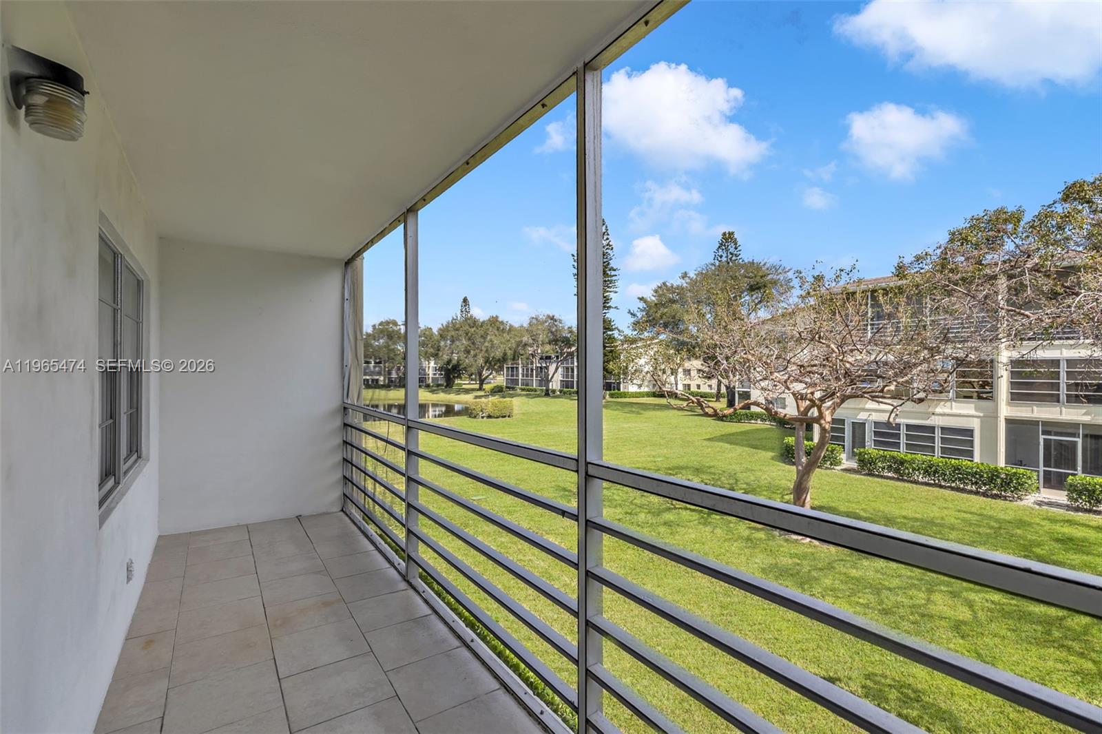 152 Dorset D, Unit 152 Boca Raton, FL 33434 - Photo 19 of 31 a view of balcony with floor