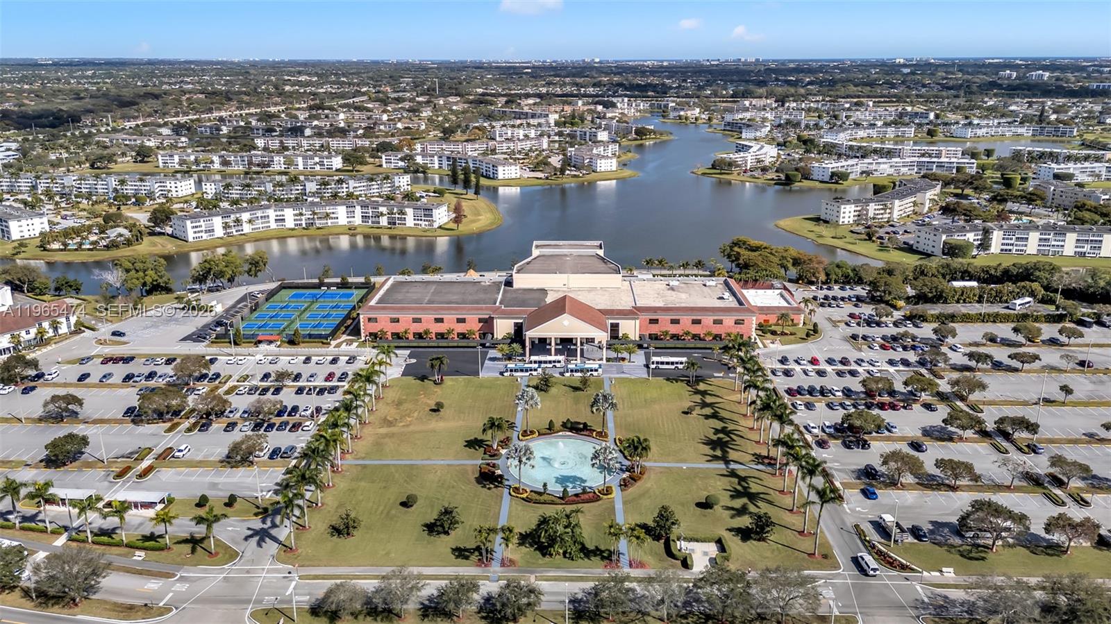 152 Dorset D, Unit 152 Boca Raton, FL 33434 - Photo 30 of 31 an aerial view of residential houses with outdoor space