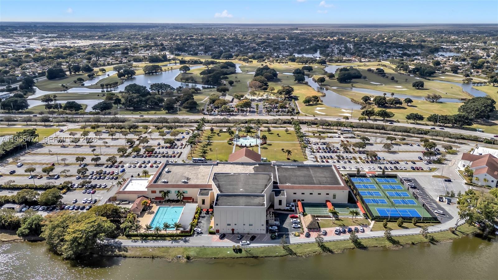 152 Dorset D, Unit 152 Boca Raton, FL 33434 - Photo 31 of 31 an aerial view of residential houses with outdoor space